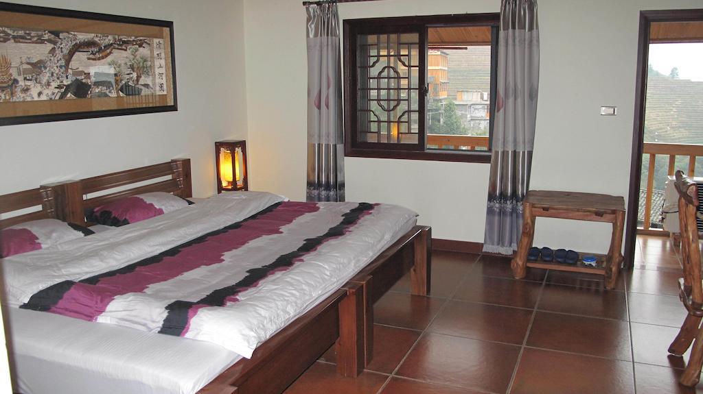 Longji Holiday Hotel Longsheng Værelse billede